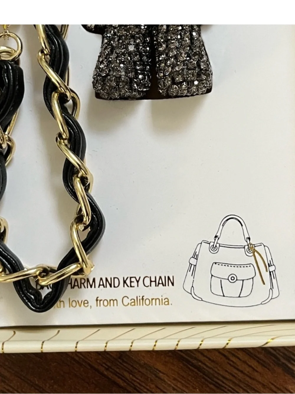 Eye Candy Black rhinestone bag charm key chain with faux pearls and gold chain